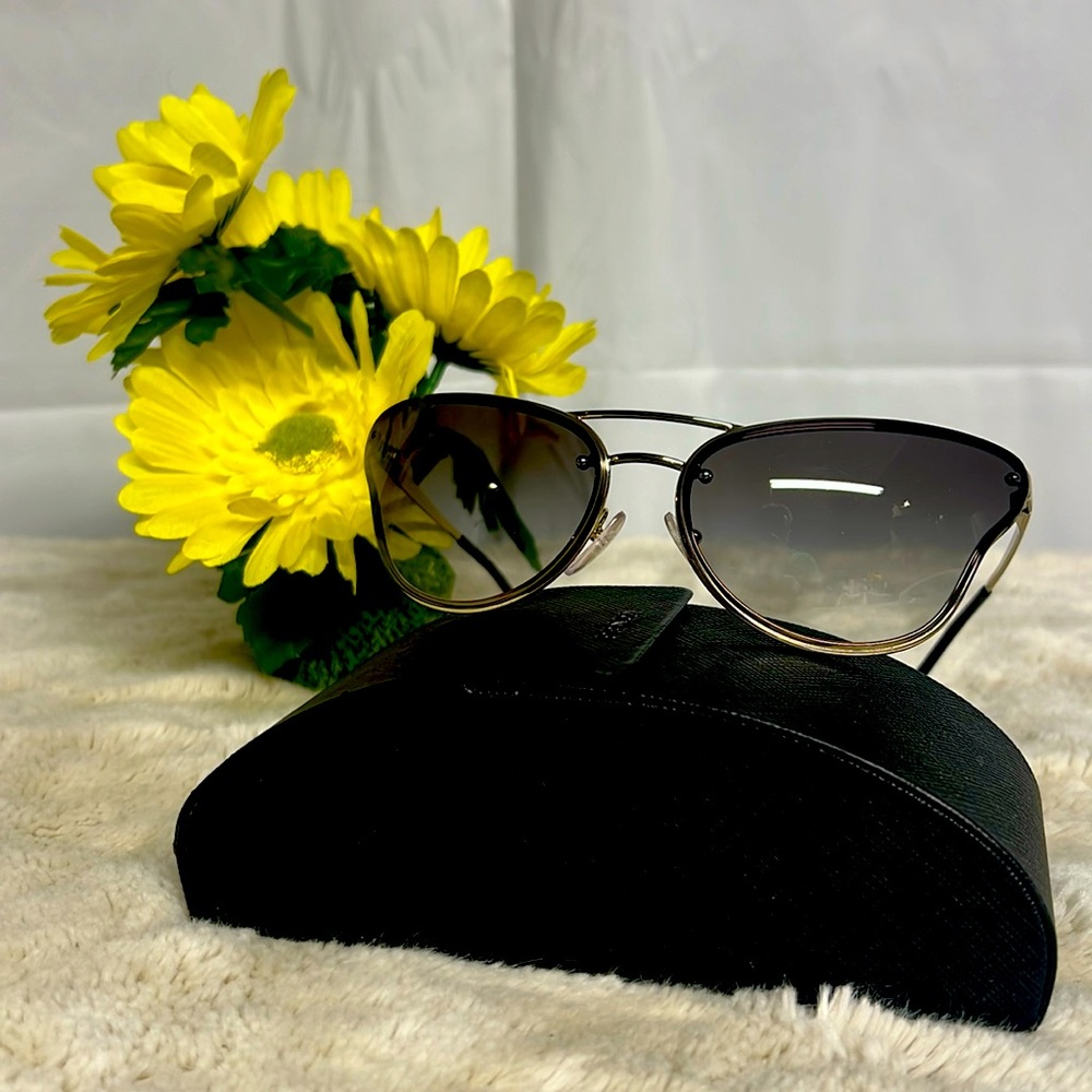 Prada sunglasses. SPR 74V 69016 zvn-0A7. Open box invert good condition.
